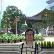 P007 ... behind me are pots of lotus and the 500 years old baeksong (lacebark pine) tree standing next to Daeungjeon; the Korean government designated this baeksong...